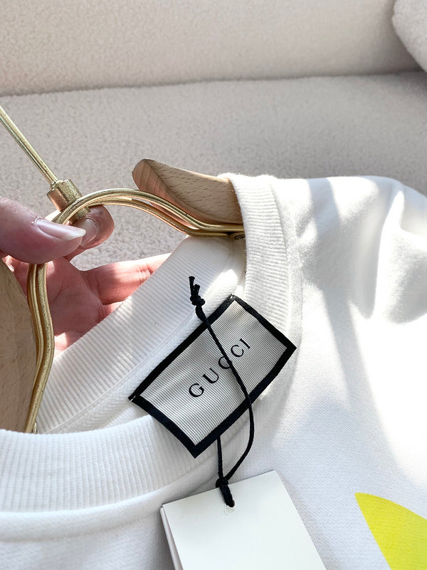 Back view of Gucci luxury clothing with monogram-inspired silhouette