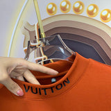 Back view of Louis Vuitton luxury clothing with monogram-inspired silhouette