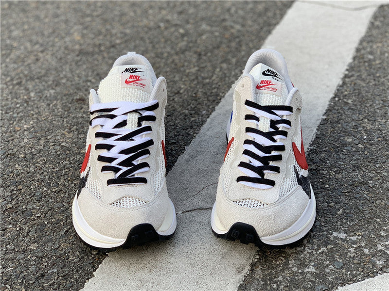 Side profile of Nike bold contrast sneakers sleek tonal finish