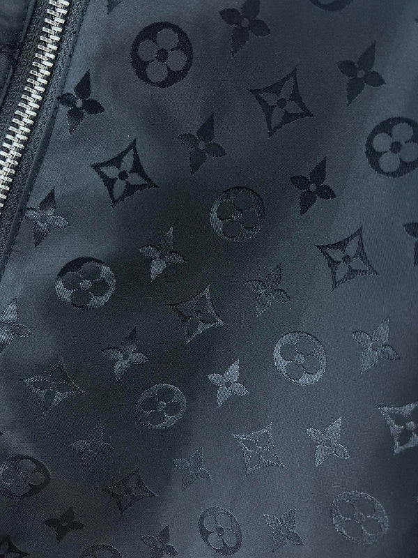 Front view of Louis Vuitton luxury clothing with label-forward styling