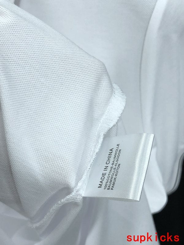 Side profile of Moncler luxury clothing with tailored silhouette