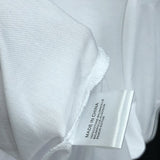 Side profile of Moncler luxury clothing with tailored silhouette