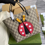 Handle and strap detail of statement modern women's handbag – women's luxury handbag