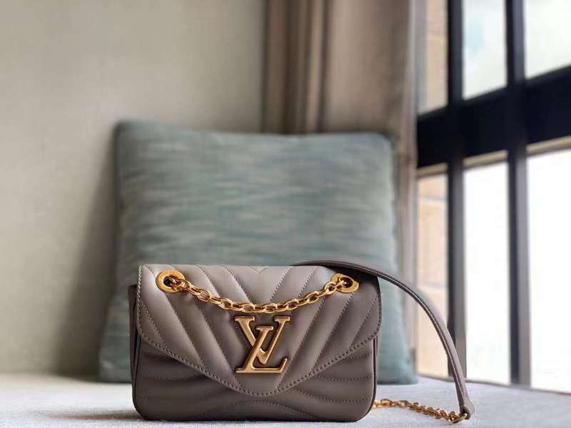 Side profile of modern sleek women's handbag – women's statement bag