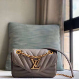 Side profile of modern sleek women's handbag – women's statement bag