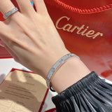 Close-up detail view of Cartier unisex jewelry piece