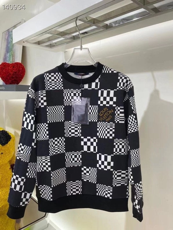 Close-up detail shot of Louis Vuitton luxury clothing with runway-inspired design
