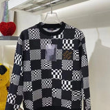 Close-up detail shot of Louis Vuitton luxury clothing with runway-inspired design