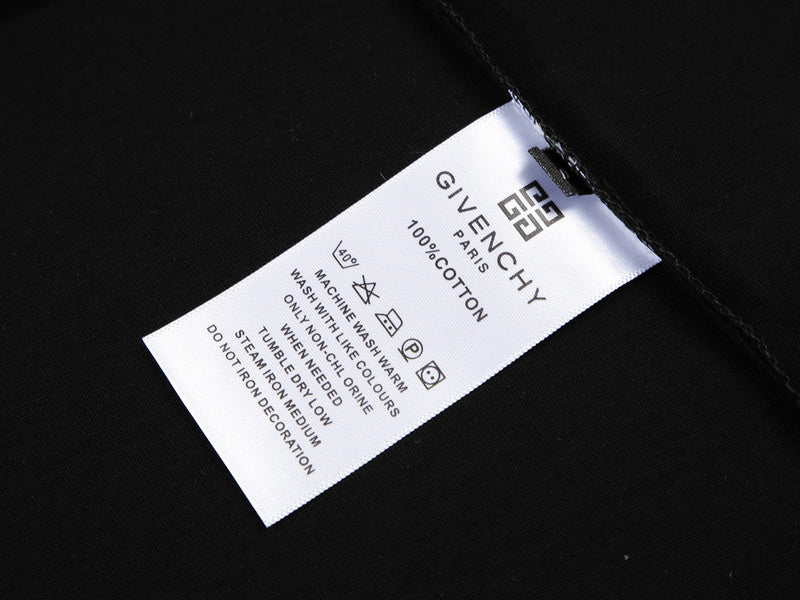 Close-up detail shot of Givenchy luxury clothing with signature branding