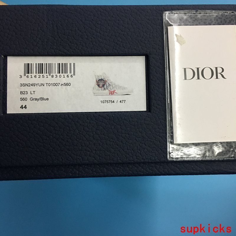 Dior Burgundy Chelsea Boots - Close-Up Texture View