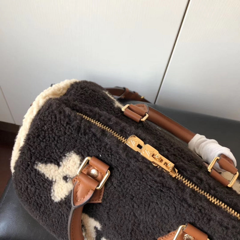 Back view of signature premium women's handbag – women's statement bag