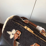 Back view of signature premium women's handbag – women's statement bag