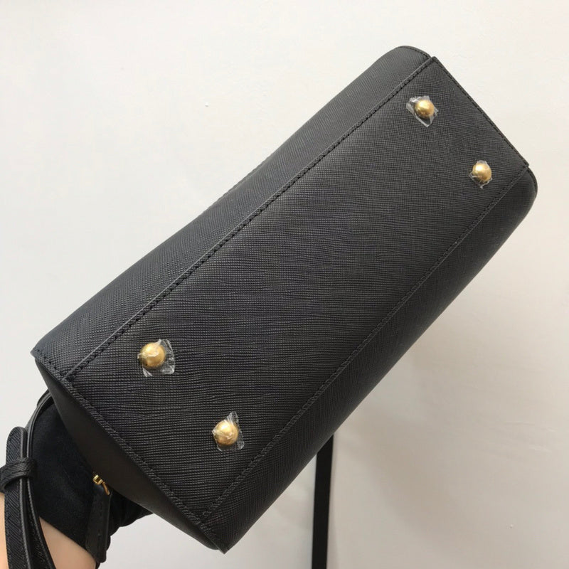 Ziva's Charm handbag – carry view (one versatile size)