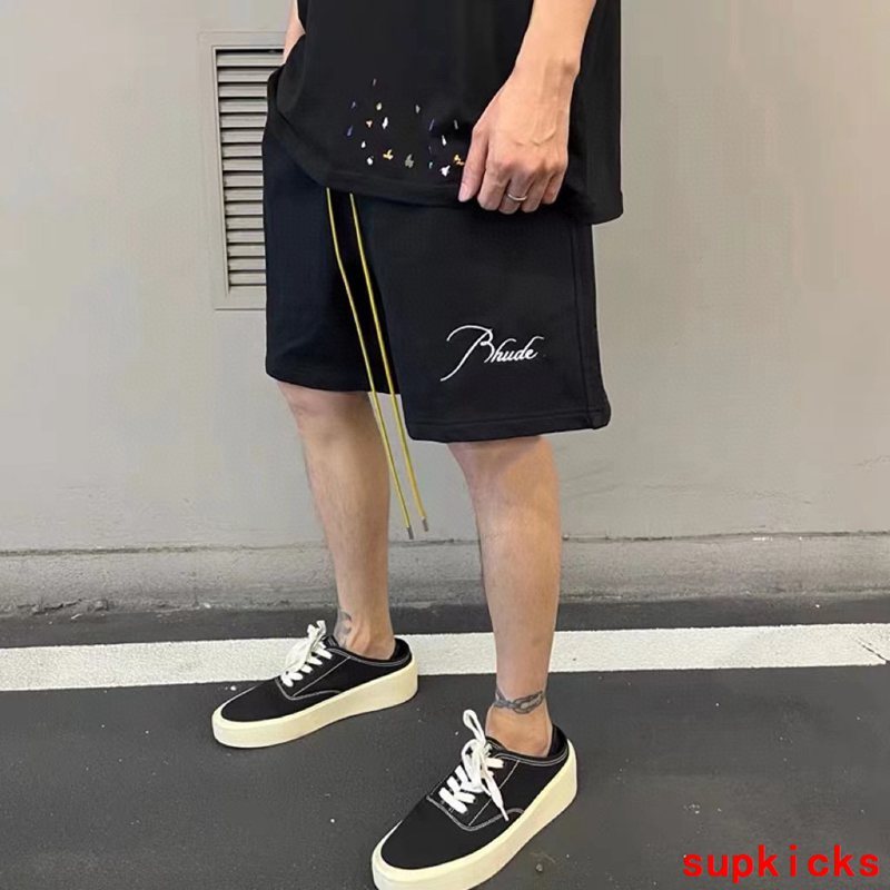 Close-up detail shot of Rhude luxury clothing with logo-detail design