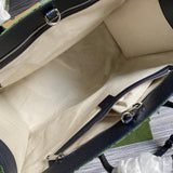 Side profile of premium signature women's handbag – women's luxury handbag