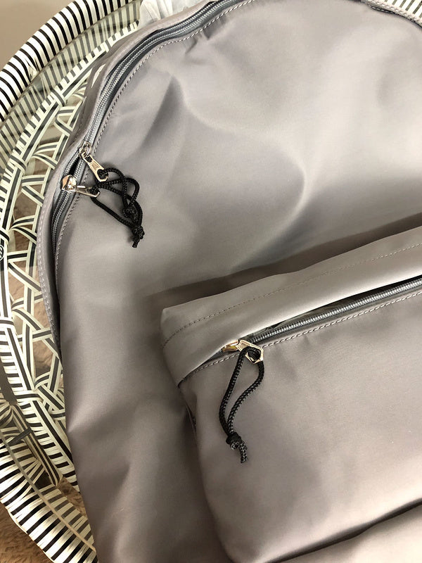 Styled lifestyle shot of polished statement women's handbag – women's statement bag