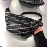 Styled lifestyle shot of classic sleek women's handbag – women's luxury accessory