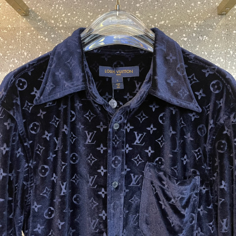 Flat lay presentation of Louis Vuitton luxury clothing with everyday silhouette