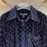 Flat lay presentation of Louis Vuitton luxury clothing with everyday silhouette