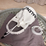 Handle and strap detail of everyday-luxe sleek women's handbag – women's designer-style accessory