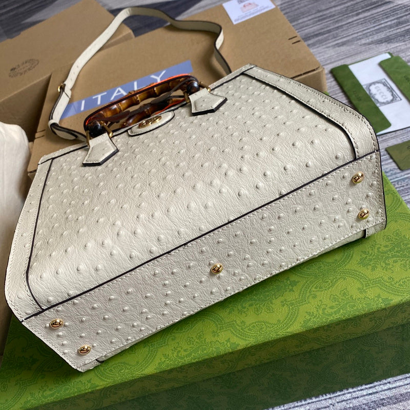 Styled lifestyle shot of signature structured women's handbag – women's luxury accessory