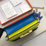 Side view of clean-lined structured handbag