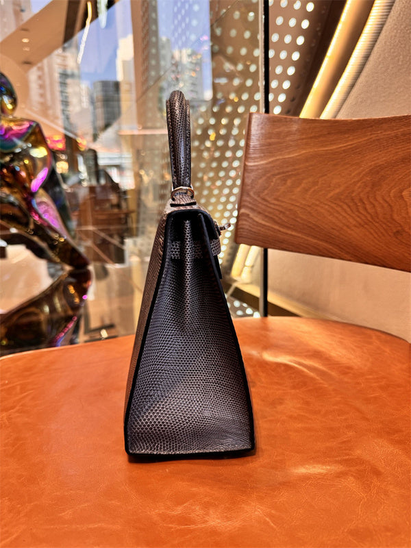 Side view of sleek structured handbag