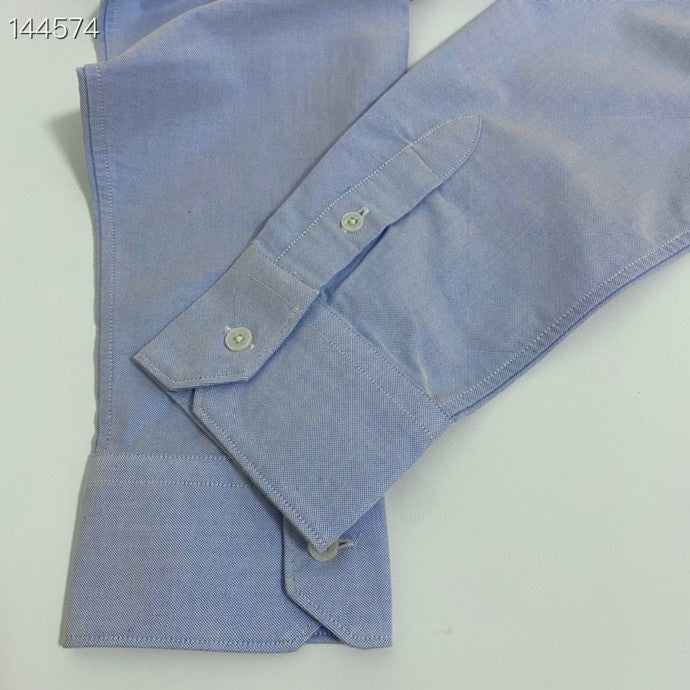 Close-up detail shot of Louis Vuitton luxury clothing with contemporary cut