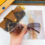 Side view of Louis Vuitton unisex sunglasses