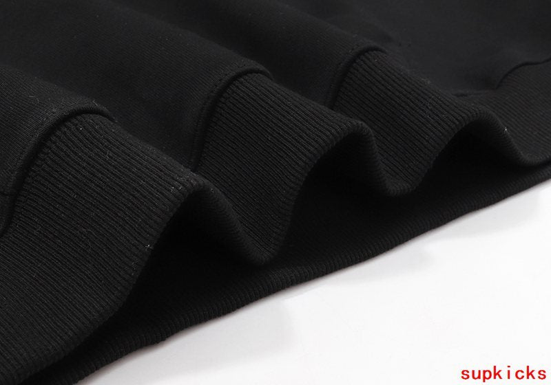 Close-up detail shot of Rhude luxury clothing with streetwear-inspired cut