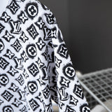 Full styled look of Louis Vuitton cotton t-shirt with monogram-inspired silhouette