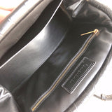 Close-up detail of modern chic women's handbag – women's designer-style accessory