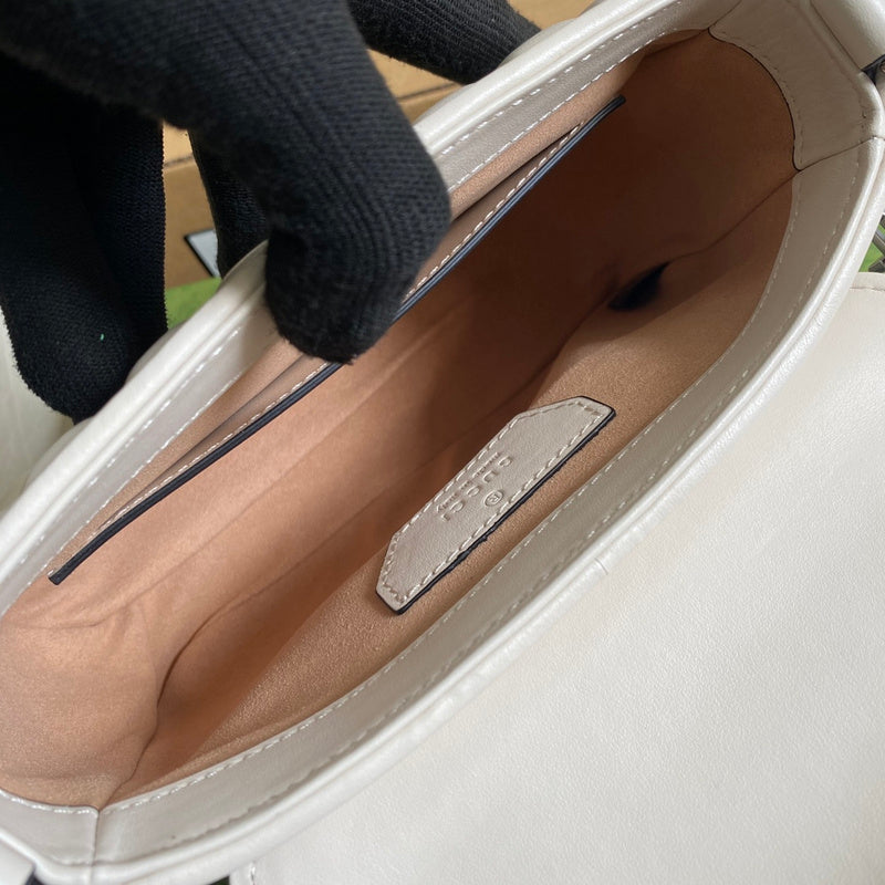 Side profile of classic statement women's handbag – women's everyday handbag