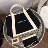 Front view of chic everyday-luxe women's handbag – women's everyday handbag