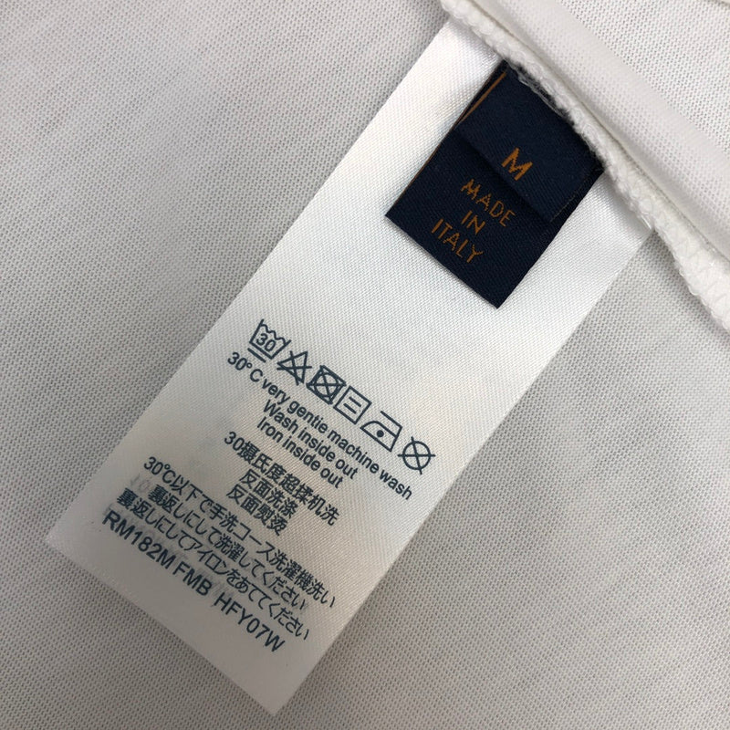 Full styled look of Louis Vuitton cotton t-shirt with label-forward styling