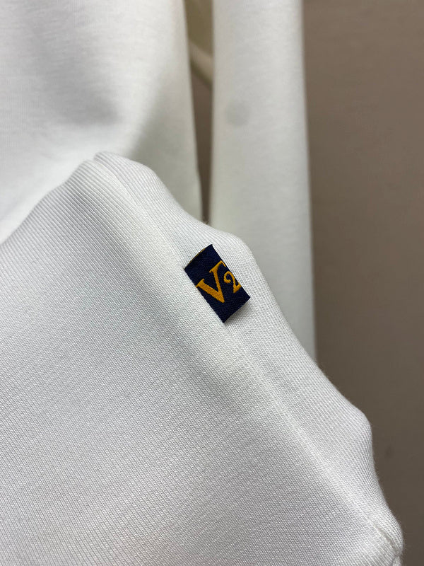 Front view of Louis Vuitton luxury clothing with runway-inspired design