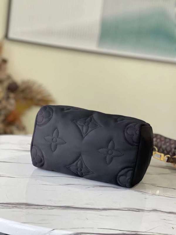 Back view of refined premium women's handbag – women's statement bag