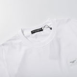 Close-up detail shot of Polo cotton polo shirt with monogram-inspired silhouette