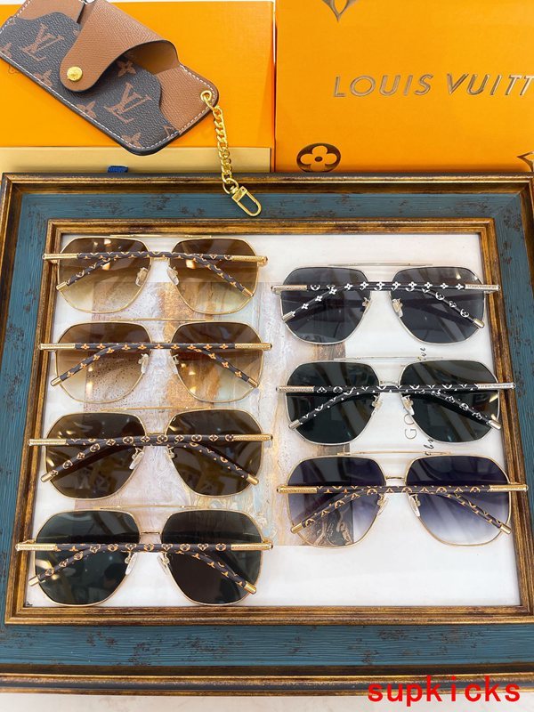 Close-up detail view of Louis Vuitton unisex sunglasses