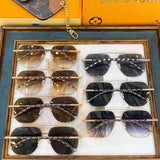 Close-up detail view of Louis Vuitton unisex sunglasses