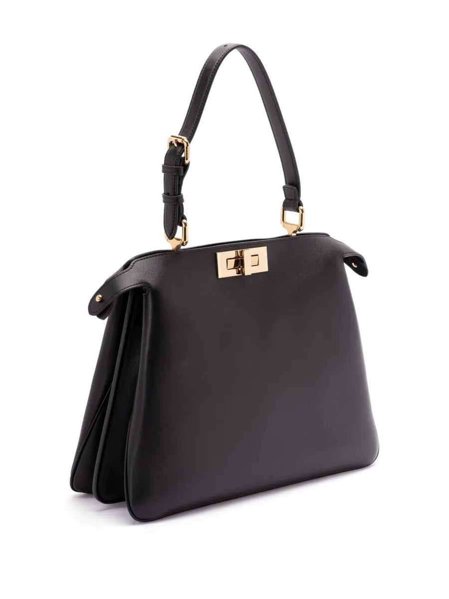 Close-up of Fendi shoulder bags hardware and fine stitching