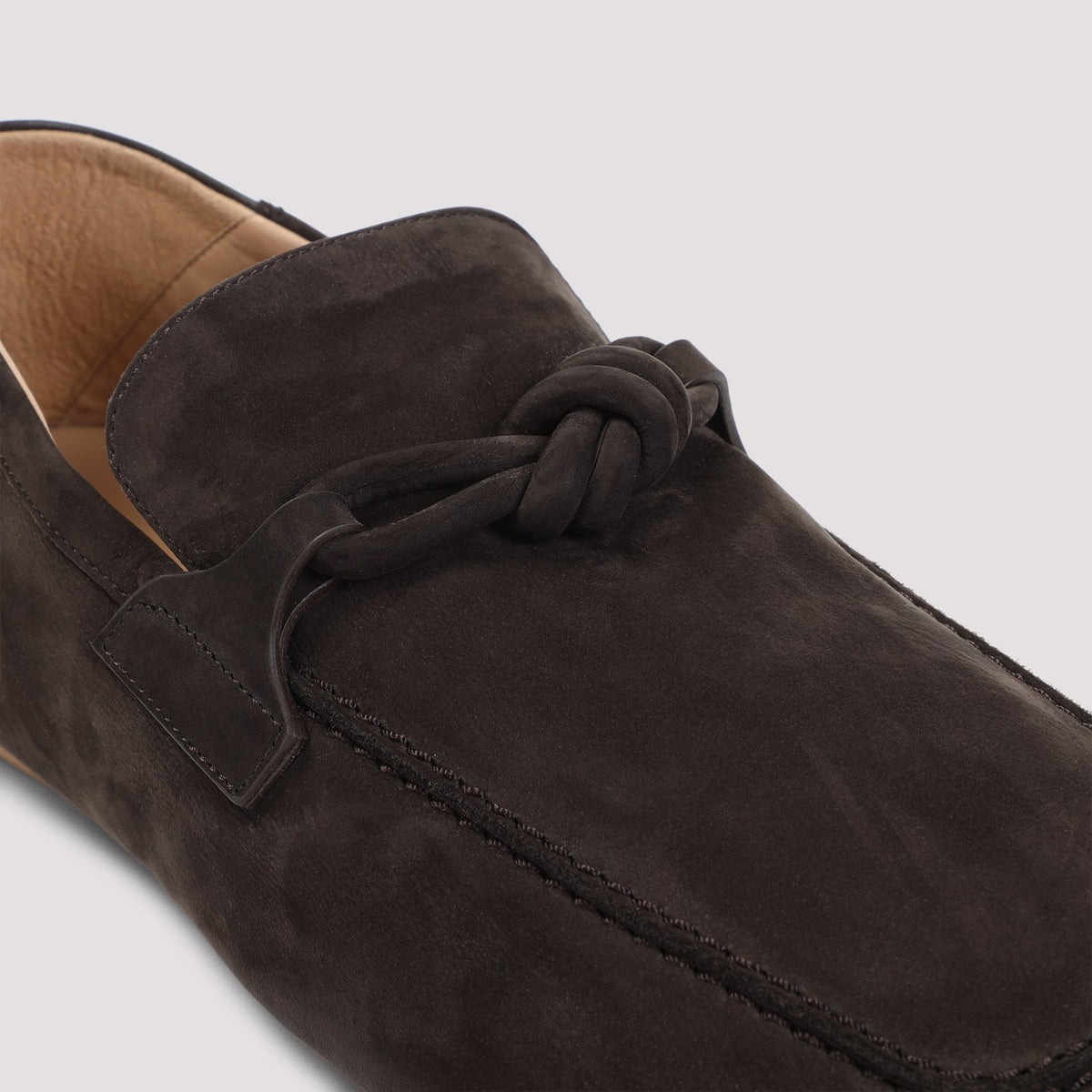 Close-up of Bottega Veneta athletic hardware and fine stitching