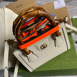 Handle and strap detail of classic signature women's handbag – women's luxury handbag