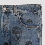 Close-up of Alexander McQueen pants hardware and fine stitching