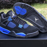 Side profile of Nike classic monochrome sneakers retro runner design
