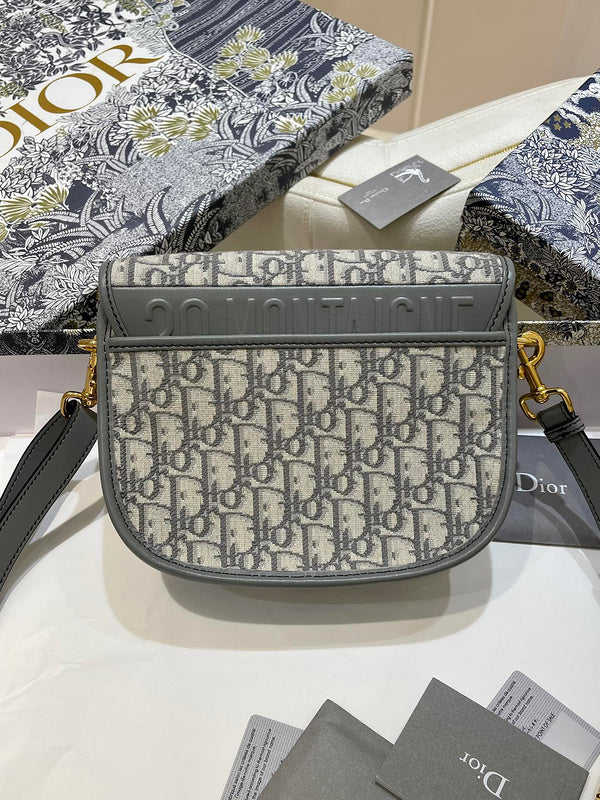 Styled lifestyle shot of classic sleek women's handbag – women's luxury handbag