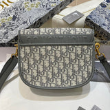 Styled lifestyle shot of classic sleek women's handbag – women's luxury handbag