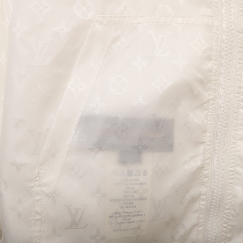 Close-up detail shot of Louis Vuitton luxury clothing with logo-detail design