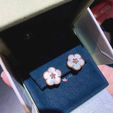 Lifestyle view of Van Cleef & Arpels unisex jewelry piece