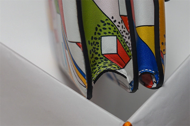 Side view of curated structured handbag